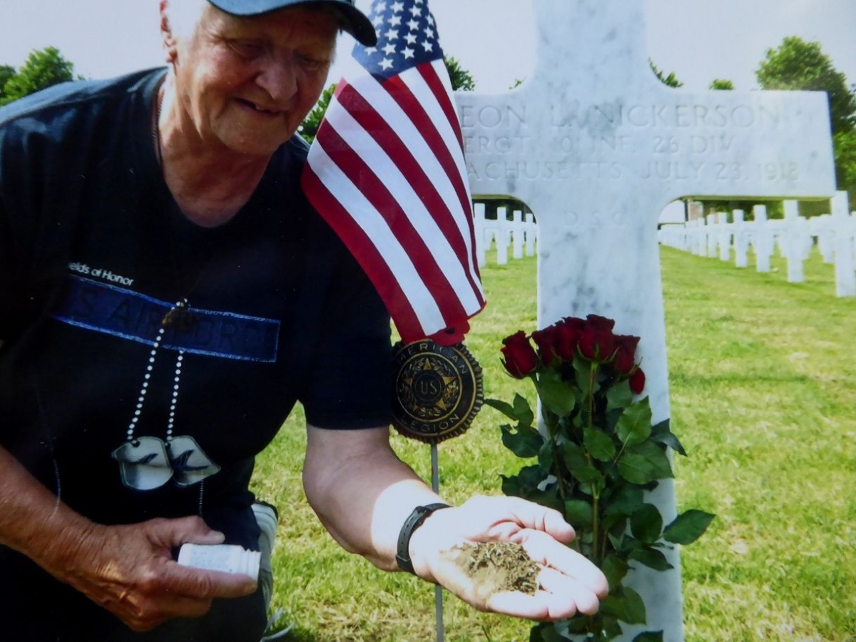 Legionaire Mary Standish visits grave of Simeon L. Nickerson The